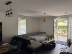 Wohnzimmer - Schöne 2-Zi-Wohnung im EG mit Terrasse und Gartenbereich in Zeesen zu vermieten