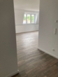 Blick Wohnbereich - 3-Zimmerwohnung Dachgeschoß mit Einbauküche in zentraler Lage von Königs Wusterhausen